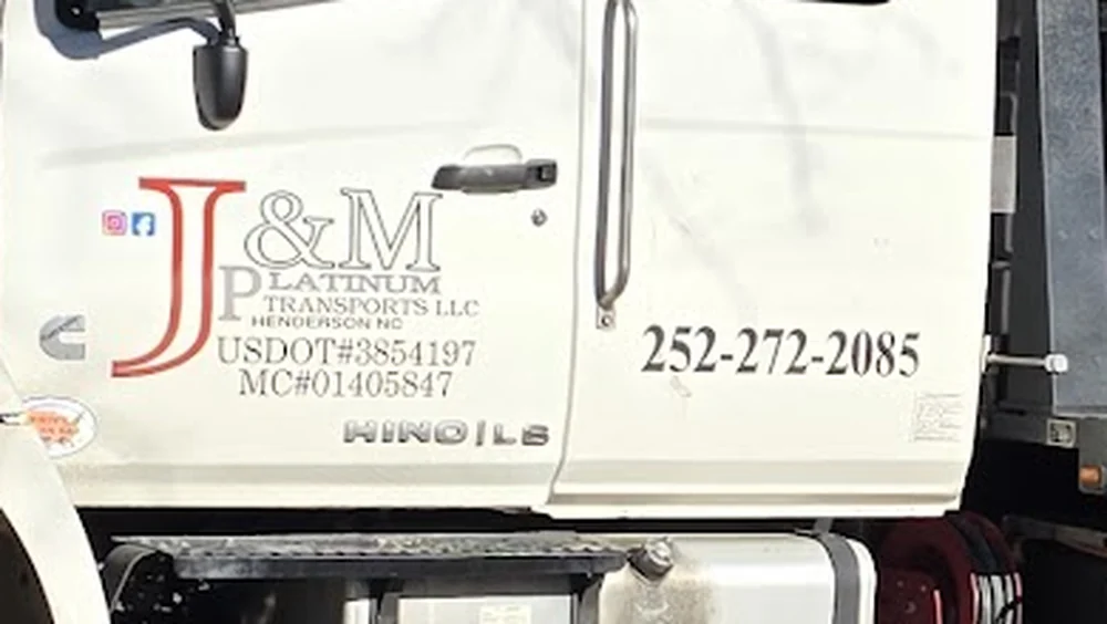 The J&M Platinum Transports door decal, reading Henderson NC, USDOT 3854197 and (252) 272-2085